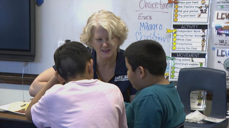 Haugan Elementary School principal Heather Yutzy and students. (WTTW News)