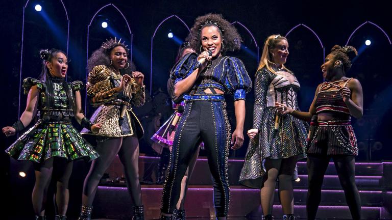 Anna Uzele, center, performs “I Don’t Need Your Love” in “Six” at Chicago Shakespeare Theater. (Photo by Liz Lauren)