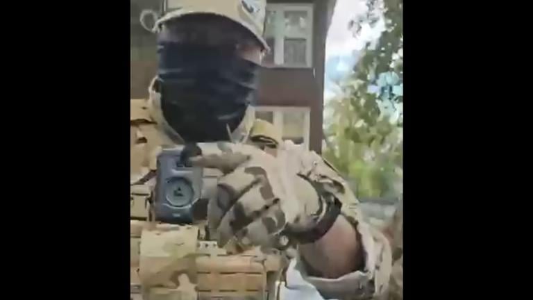 A still from a video captured by State. Rep. Hoan Huynh of federal immigration agents. 