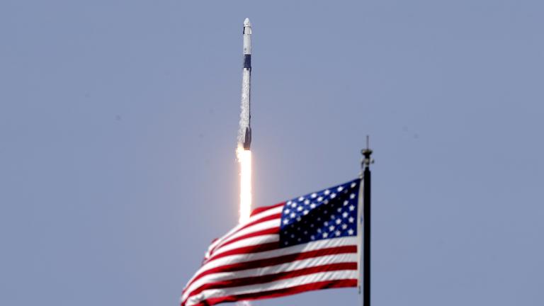 A SpaceX Falcon 9, with NASA astronauts Doug Hurley and Bob Behnken in the Dragon crew capsule, lifts off from Pad 39-A at the Kennedy Space Center in Cape Canaveral, Fla., Saturday, May 30, 2020. (AP Photo / John Raoux)