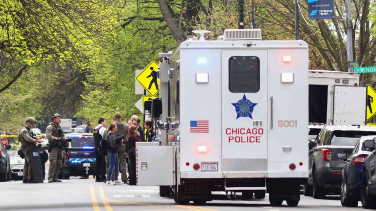 Police officers work the scene outside Endeavor Health Swedish Hospital in Lincoln Square, on Saturday, April 25, 2026. (Anthony Vazquez / Chicago Sun-Times via AP)