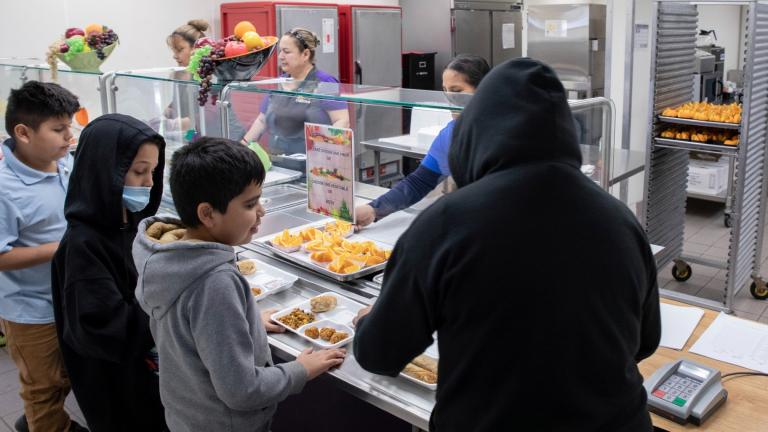 Students select their meal during lunch break in the cafeteria at V. H. Lassen Academy of Science and Nutrition in Phoenix, Tuesday, Jan. 31, 2023. (AP Photo / Alberto Mariani)