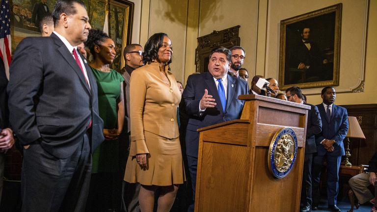 Gov. J.B. Pritzker addresses a new bill to raise the state's minimum wage to $15 an hour on Thursday, Feb. 7, 2019. (Justin L. Fowler/The State Journal-Register via AP)