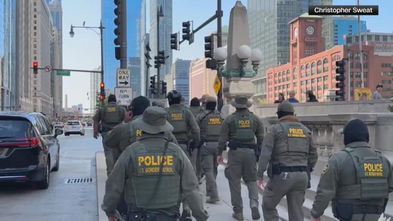 Federal agents walk through downtown Chicago in this file photo. (Courtesy of Christopher Sweat)
