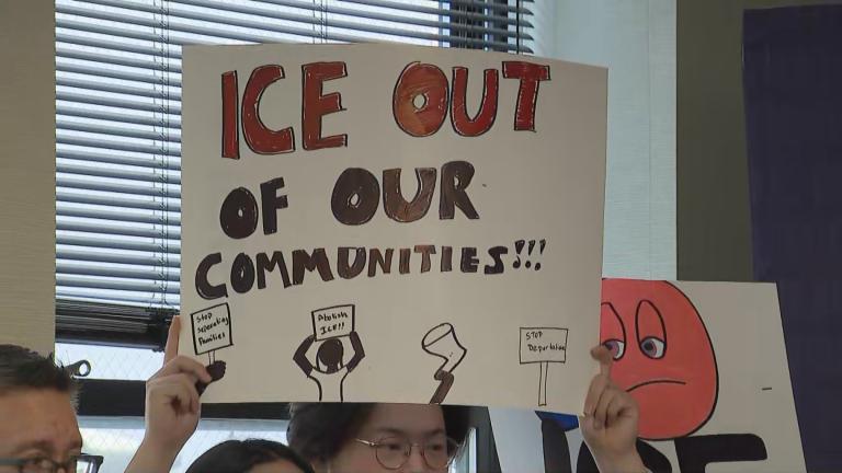 Local immigrant advocates gather on June 12, 2025 to condemn federal immigration raids. (WTTW News)