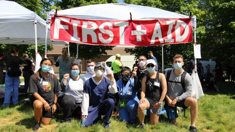 Health care workers volunteering as street medics set up a first aid tent during a rally held June 6, 2020 in Union Park. (Courtesy Dakota Lane)