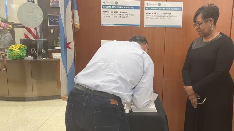 Ald. Michelle Harris (8th Ward) looks on while filing the map supported by the Chicago City Council's Black Caucus with the Chicago City Clerk's office on Tuesday, March 15. (Heather Cherone/WTTW News)