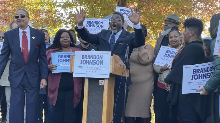 Brandon Johnson greets the crowd at Seward Park as he launches his campaign for mayor. (Heather Cherone/WTTW News)
