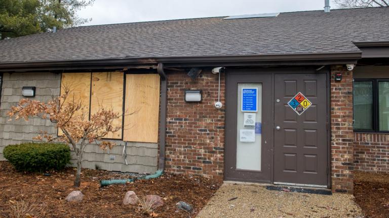 A front window is boarded up at the Planned Parenthood Health Center at 2709 Knoxville Avenue in Peoria, Ill., on Monday, Jan. 16, 2023. (Matt Dayhoff / Journal Star via AP)