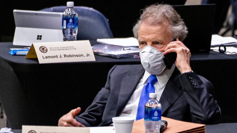 In this May 23, 2020 file photo, Illinois Speaker of the House Michael Madigan, D-Chicago, talks on his cellphone from his desk during an extended session of the Illinois House of Representatives at the Bank of Springfield Center, in Springfield, Ill. (Justin L. Fowler / The State Journal-Register via AP, Pool, File)