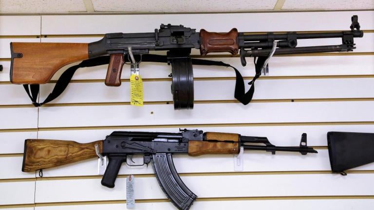 Assault style weapons are displayed for sale at Capitol City Arms Supply on Jan. 16, 2013, in Springfield, Ill. (AP Photo / Seth Perlman, File)