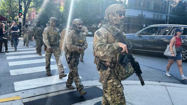 Federal agents patrol downtown Chicago, Sunday, Sept. 28, 2025. (AP Photo / Sophia Tareen)