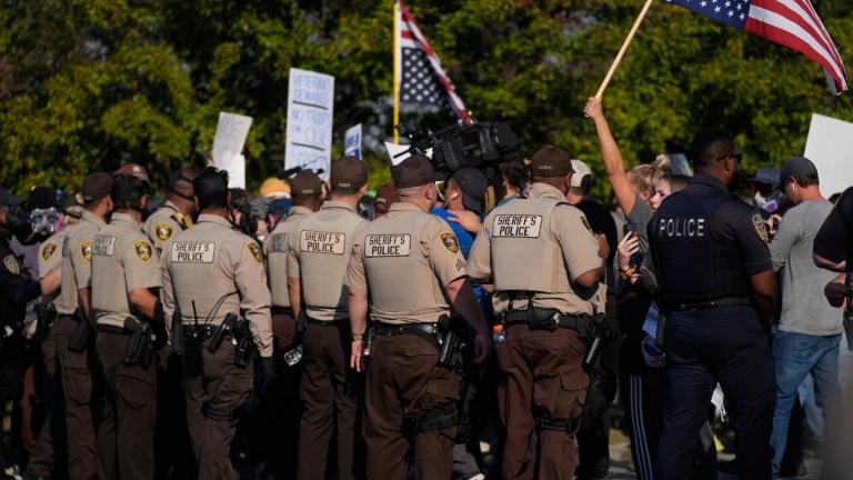 Law enforcement hold back protesters near an Immigration and Customs Enforcement facility in Broadview, Ill., Friday, Oct. 3, 2025. (AP Photo / Erin Hooley)