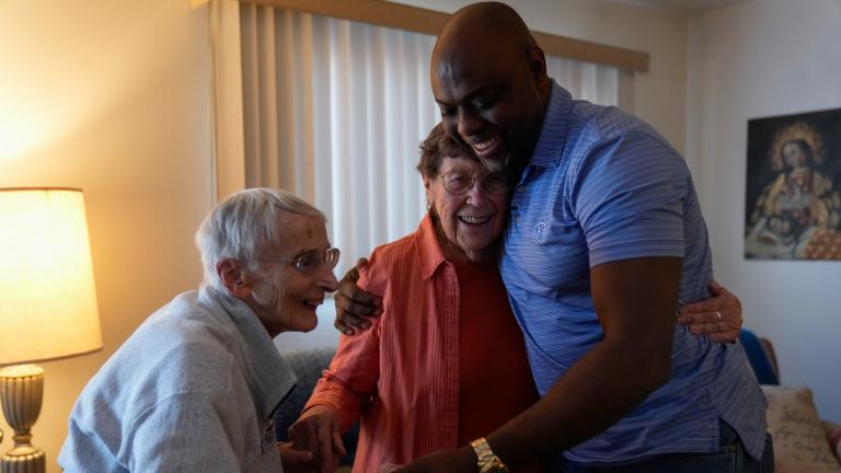 Oscar, an immigrant from Central America seeking asylum, right, visits Sister Pat Murphy, 95, left, and Sister JoAnn Persch, 90, nuns with the Sisters of Mercy, at their home Thursday, Feb. 20, 2025, in Alsip, Ill. (AP Photo / Erin Hooley)