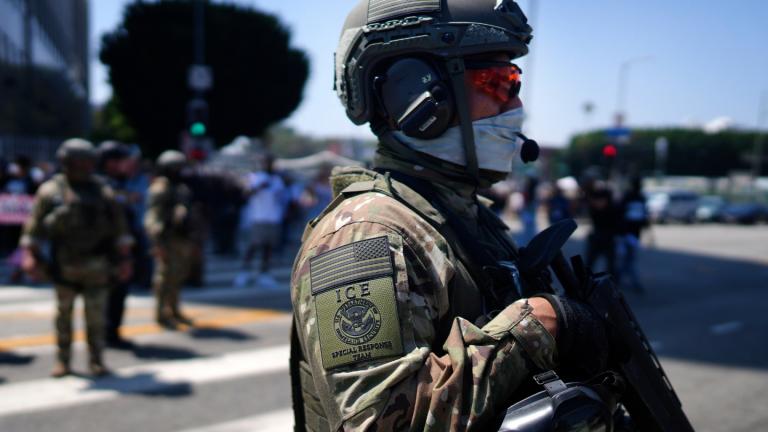 An ICE Special Response Team member stands guard outside the Metropolitan Detention Center, while protesters gather outside to denounce the ICE, U.S. Immigration and Customs Enforcement, operations, June 10, 2025, in downtown Los Angeles. (AP Photo / Eric Thayer, File)