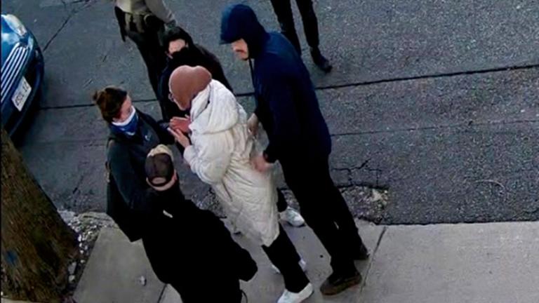 In this image taken from security camera video, Rumeysa Ozturk, a 30-year-old doctoral student at Tufts University, is detained by Department of Homeland Security agents on a street in Sommerville, Mass., Tuesday, March 26, 2025. (AP Photo)