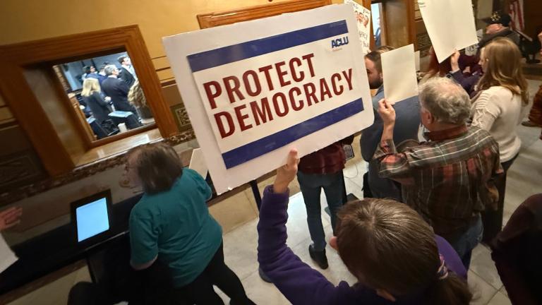 Protesters gather outside the Senate chamber at the Statehouse as senators meet during a special session to vote on a new congressional map Monday, Dec. 8, 2025, in Indianapolis. (AP Photo / Obed Lamy)