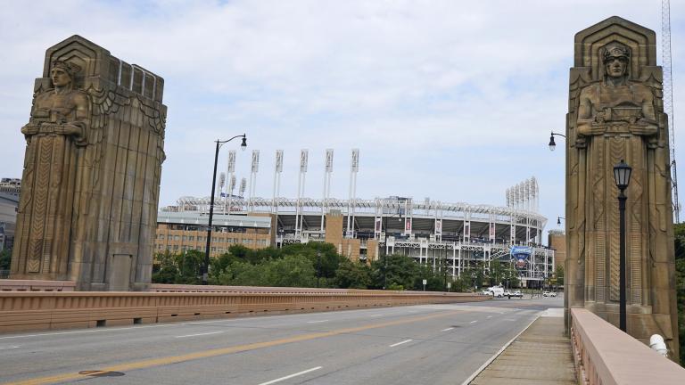 Two guardians rest on the Hope Memorial Bridge within site of Progressive Field, Friday, July 23, 2021, in Cleveland. Cleveland's new name was inspired by two large landmark stone edifices near the downtown ballpark, referred to as traffic guardians, on the Hope Memorial Bridge over the Cuyahoga River. The team's colors will remain the same, and the new Guardians' new logos will incorporate some of the architectural features of the bridge. (AP Photo / Tony Dejak)