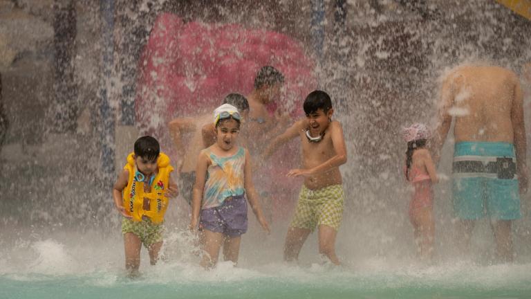 People escape the searing summer heat at Baghdad Aquatic Center in Baghdad, Iraq, Thursday, July, 6, 2023. (AP Photo / Hadi Mizban)