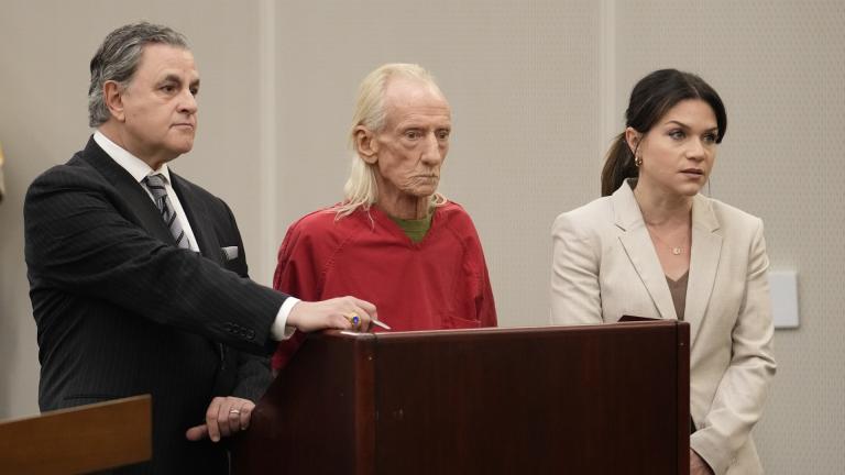 Joseph Czuba, 71, center, stands with his attorneys George Lenard and Kylie Blatti, before Circuit Judge Dave Carlson for Czuba's arraignment in the murder of 6-year old Wadea Al Fayoume, at the Will County, Ill., courthouse, Monday, Oct. 30, 2023, in Joliet, Ill. Czuba is accused of fatally stabbing the Muslim boy and seriously wounding his mother, was also charged with a hate crime. (AP Photo/Charles Rex Arbogast)