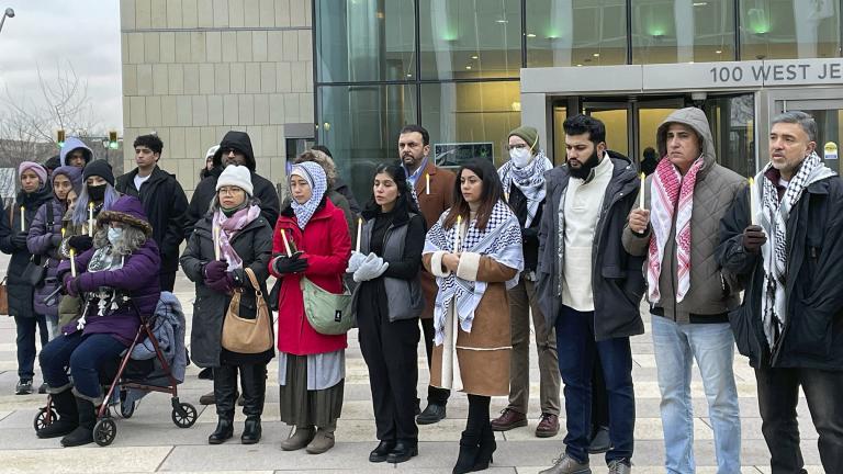 Attendees gather to honor the memory of 6-year-old Wadee Alfayoumi in front of Will County Courthouse, Wednesday, Jan. 3, 2024, in Joliet, Ill. (AP Photo / Claire Savage)
