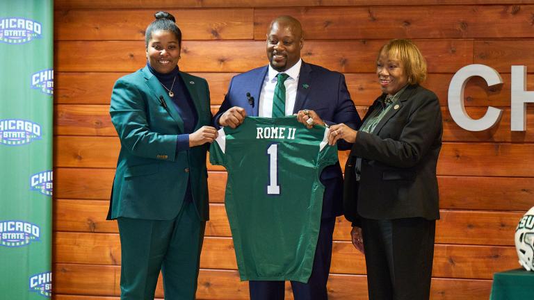 Chicago State University football coach Bobby Rome II (center) appears at a press event. (Courtesy of Chicago State University)