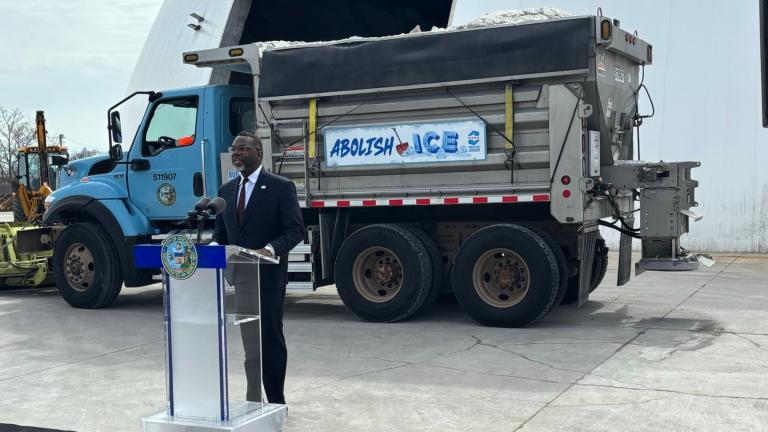 Mayor Brandon Johnson addresses the news media in front of the "Abolish ICE snowplow" on March 25, 2026. (Heather Cherone / WTTW News)
