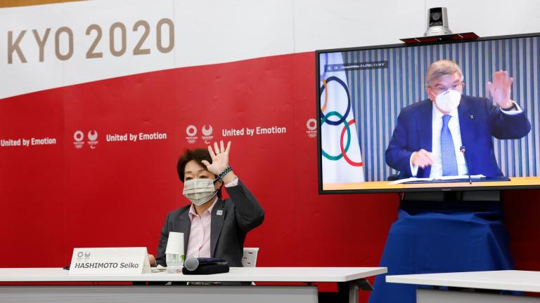 Tokyo 2020 President Seiko Hashimoto and IOC President Thomas Bach, on a screen, greet each other during a five-party online meeting at Harumi Island Triton Square Tower Y in Tokyo Monday, June 21, 2021. (Rodrigo Reyes Marin / Pool Photo via AP) Tokyo 2020 President Seiko Hashimoto and IOC President Thomas Bach, on a screen, greet each other during a five-party online meeting at Harumi Island Triton Square Tower Y in Tokyo Monday, June 21, 2021. (Rodrigo Reyes Marin / Pool Photo via AP)