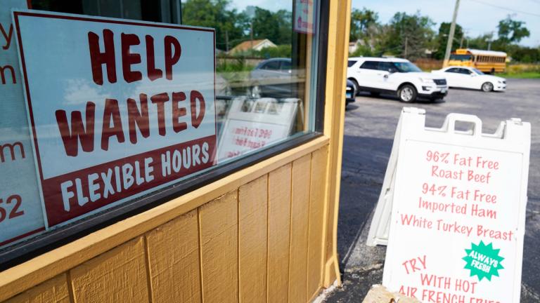 A help wanted sign is displayed in Deerfield, Ill., Wednesday, Sept. 21, 2022. The U.S. government will issue the October jobs report on Friday morning. (AP Photo / Nam Y. Huh, File)
