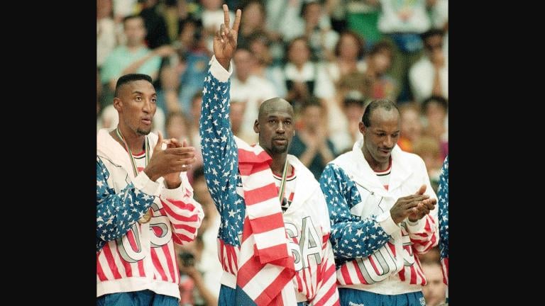 United States’ Scottie Pippen, left, Michael Jorden, center, and Clyde Drexler rejoice, Aug. 8, 1992, with their gold medals after beating Croatia, 117-85, in Olympic basketball in Barcelona, Spain. The jacket that Jordan famously wore but covered the Reebok logo of at the 1992 Barcelona Olympics will be offered at auction by Sotheby’s in June 2023. (AP Photo / Susan Ragan, File)