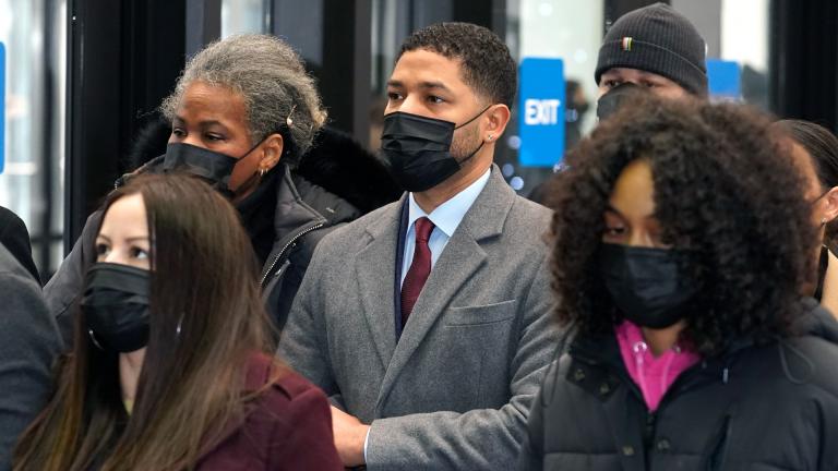 Actor Jussie Smollett, center, arrives with his mother Janet, left, and other family members at the Leighton Criminal Courthouse for day three of his trial in Chicago on Wednesday, Dec. 1, 2021. Smollett is accused of lying to police when he reported he was the victim of a racist, anti-gay attack in downtown Chicago nearly three years ago. (AP Photo / Charles Rex Arbogast)