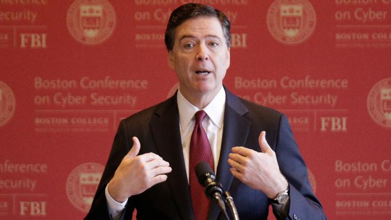FBI Director James Comey gestures as he speaks on cyber security at the first Boston Conference of Cyber Security at Boston College, March 8, 2017, in Boston. (AP Photo / Stephan Savoia, File)