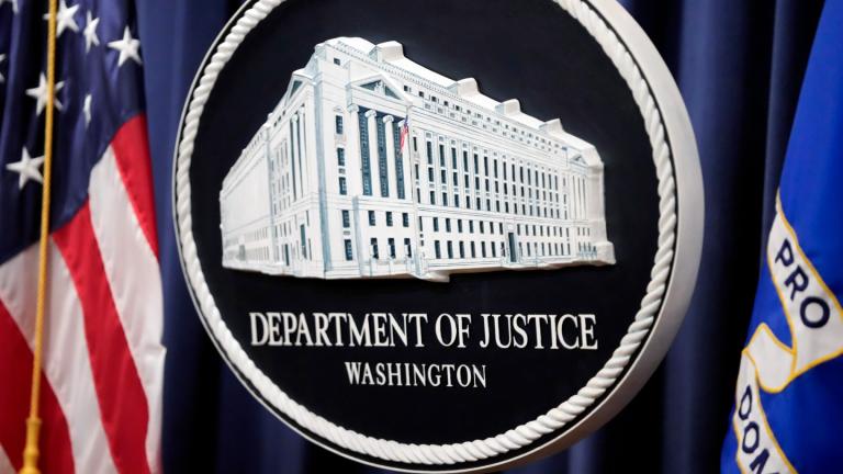The logo for the Justice Department is seen before a news conference at the Department of Justice, Aug. 23, 2024, in Washington. (AP Photo / Mark Schiefelbein, File)