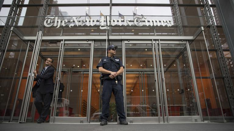 In this June 28, 2018, file photo, a police officer stands outside The New York Times building in New York. (AP Photo / Mary Altaffer, File)
