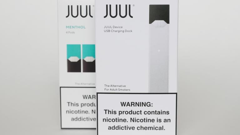 Packaging for an electronic cigarette and menthol pods from Juul Labs is displayed on Feb. 25, 2020, in Pembroke Pines, Fla. (AP Photo / Brynn Anderson, File)