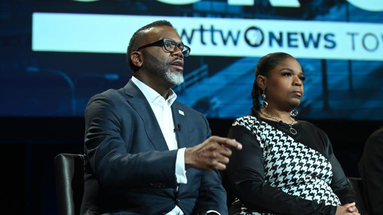 Brandon Johnson (left) speaks at a WTTW town hall event on Feb. 3, 2025. (Ken Carl / WTTW)