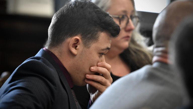 Kyle Rittenhouse puts his hand over his face after he is found not guilty on all counts at the Kenosha County Courthouse in Kenosha, Wis., on Friday, Nov. 19, 2021. (Sean Krajacic / The Kenosha News via AP, Pool)