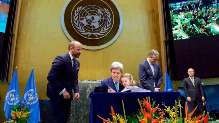 U.S. Secretary of State John Kerry signs the Paris Agreement on April 22. (@JohnKerry / Twitter)