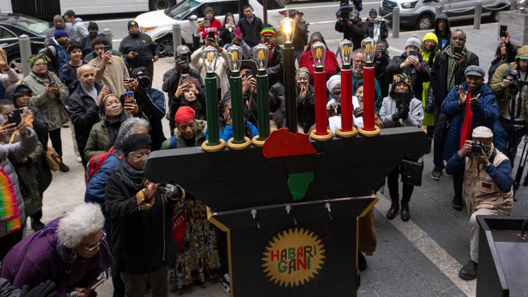 FILE - Philadelphians and visitors gather during the the lighting of the city's first kinara on the first day of Kwanzaa celebrations at the Philadelphia City Hall grounds, Dec. 26, 2023. (Jose F. Moreno / The Philadelphia Inquirer via AP, File)