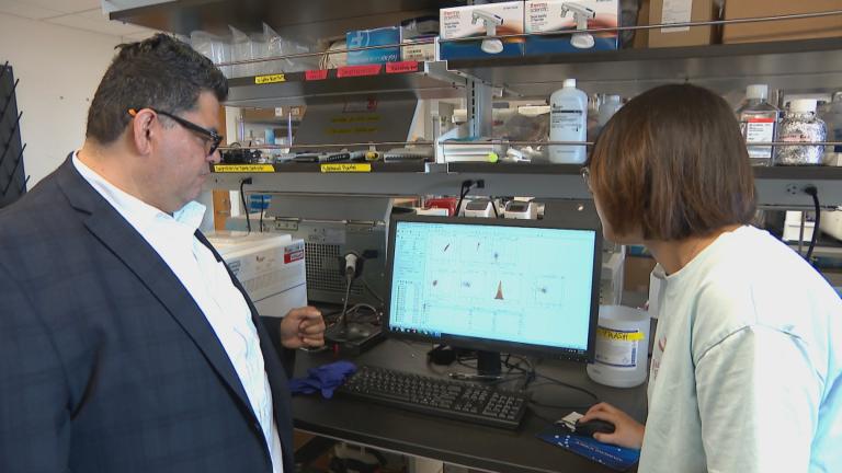 Dr. Juan Mendoza (left) is a professor, protein engineer and computational biologist at the University of Chicago. (WTTW News)