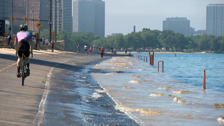Lake Michigan waves cover Chicago’s lakefront path in the summer of 2019. (WTTW News)