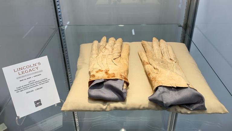 A pair of stained leather gloves carried by Abraham Lincoln at Ford's Theatre the night of his assassination on April 14, 1865, will be up for auction. It is estimated at $800,000 to $1.2 million. (Eunice Alpasan / WTTW News)