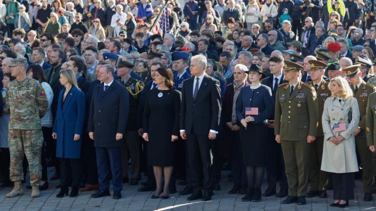 Lithuania's President Gitanas Nauseda, center, U.S. Ambassador to Lithuania Kara C. McDonald, second left, and Speaker of Lithuanian Parliament Saulius Skvernelis, third left, attend a solemn farewell ceremony at Cathedral Square in Vilnius, Lithuania, Thursday, April 3, 2025 for the US soldiers who died during training exercise. (AP Photo  / Mindaugas Kulbis)