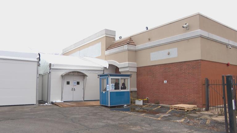 A migrant shelter opened Jan. 10, 2024, at a former CVS in Little Village. (WTTW News)