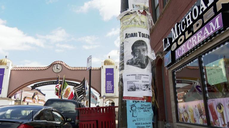A flyer with the name and face of Adam Toledo, the 13-year-old boy who was fatally shot by a Chicago police officer on March 29, is shown on a lamppost in the Little Village neighborhood, where he lived and died. (WTTW News)