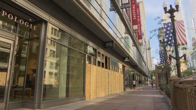 Boarded-up storefronts in the Loop on Monday, June 1, 2020 show damage caused by looting over the weekend. (WTTW News)