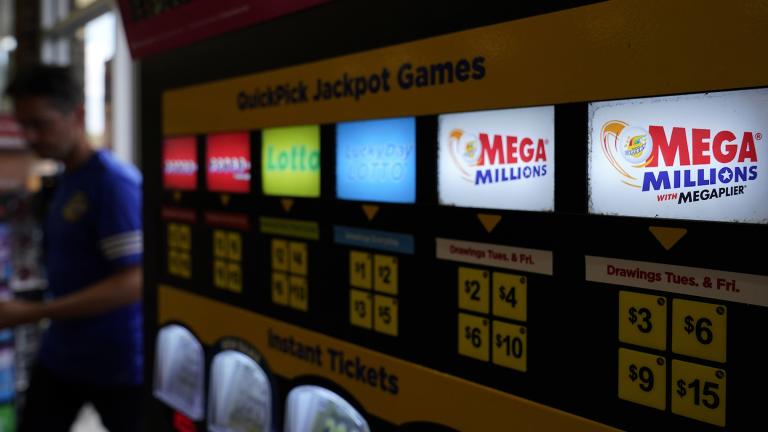  A lottery ticket vending machine sits a convenience store, July 21, 2022, in Northbrook, Ill. The next Mega Millions drawing is Tuesday, July 25, 2022 with a jackpot at $790 million. (AP Photo / Nam Y. Huh, file)