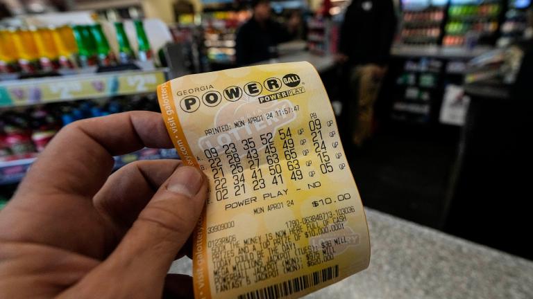 A Powerball lottery ticket is dipslayed seen inside a convenience store, Monday, April 1, 2024, in Kennesaw, Ga. An estimated $1.09 billion Powerball jackpot that ranks as the 9th largest in U.S. lottery history will be up for grabs Wednesday night, April 3. (AP Photo / Mike Stewart, FIle)