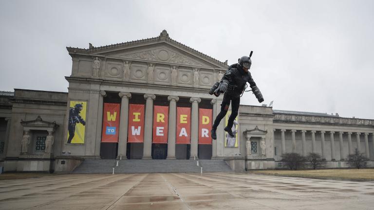 Richard Browning of Gravity Industries demonstrates his Jet Suit as he takes off from the steps of the Museum of Science and Industry in Chicago. (Courtesy of MSI Chicago) 
