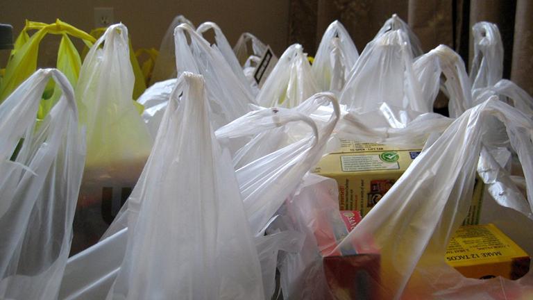 Starting Aug. 1, 2016, chain stores that are 10,000 square feet or less must comply with the city's plastic bag ban originally enacted a year ago. (MTSOfan / Flickr)